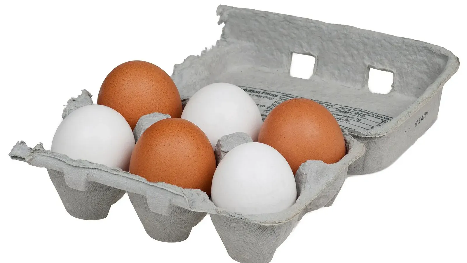 A cardboard carton holding six brown chicken eggs